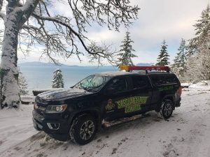 Sasquatch pest control work truck on Chuckanut Drive in Bellingham Washington