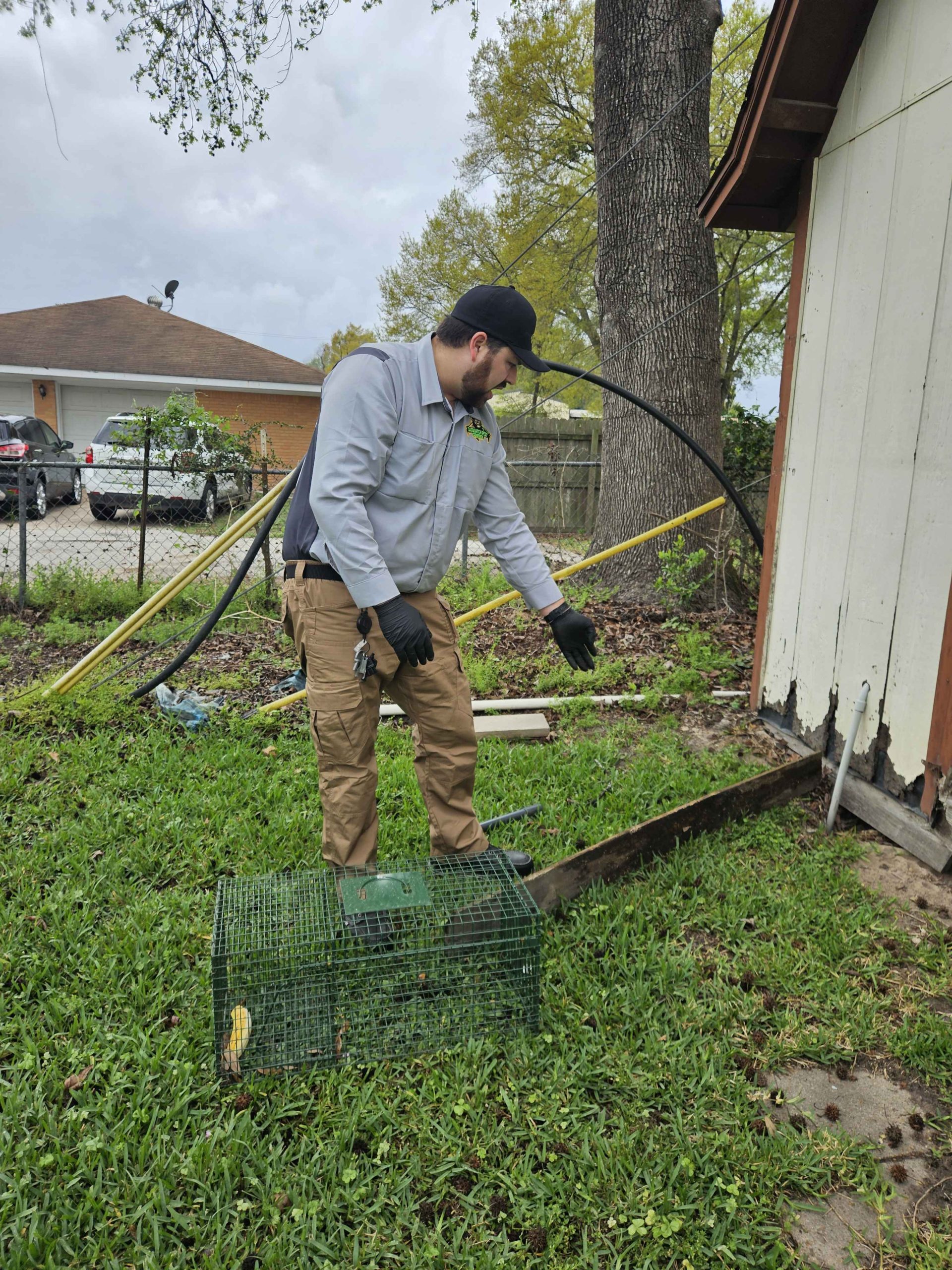 Sasquatch technician performing an exterior treatment